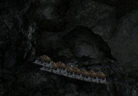 Several Physicorium ores in a Rock Cave.